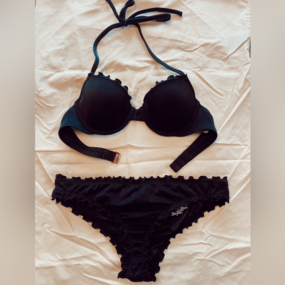 Black swimsuit with ruffles